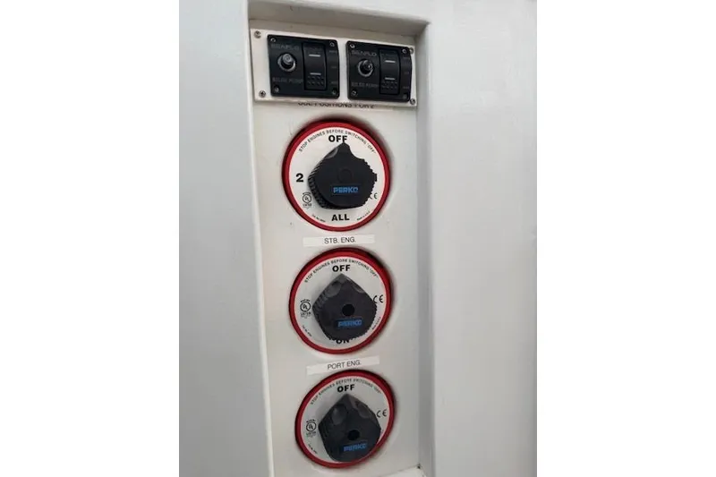Slide: The Image of Control panel of a 1978 Dyer 40 Custom Express Cruiser with Perko switches. - 37