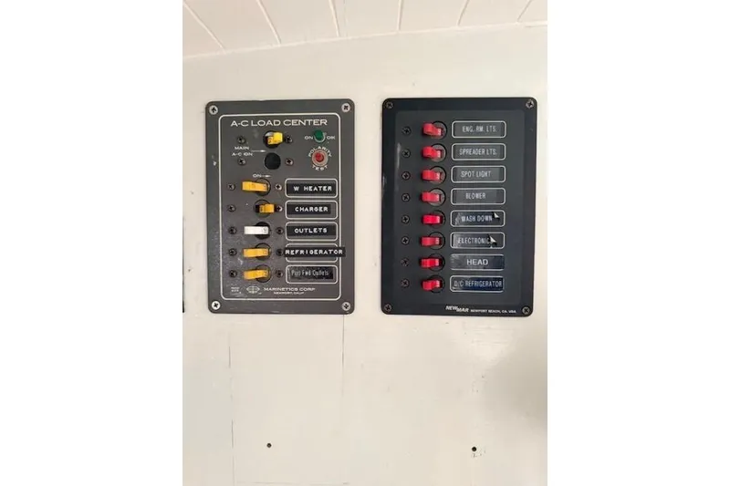 Slide: The Image of Electrical control panels on a 1978 Dyer 40 Custom Express Cruiser. - 50
