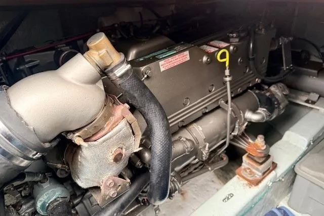 Slide: The Image of Engine of 1978 Dyer 40 Custom Express Cruiser, showcasing mechanical components. - 77