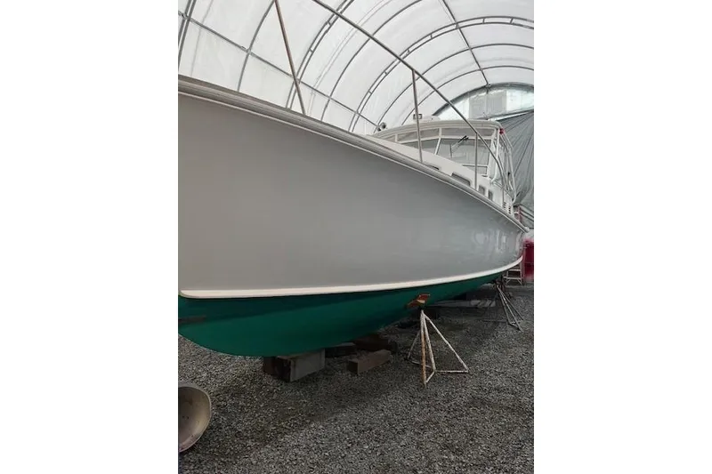 Slide: The Image of 1978 Dyer 40 Express Cruiser in storage, showcasing sleek design and sturdy construction. - 9