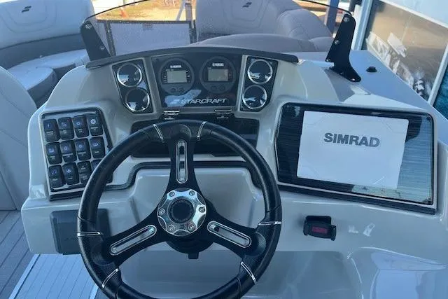 Slide: The Image of Dashboard of 2024 Starcraft SLS 3 Q DH with Simrad display. - 5