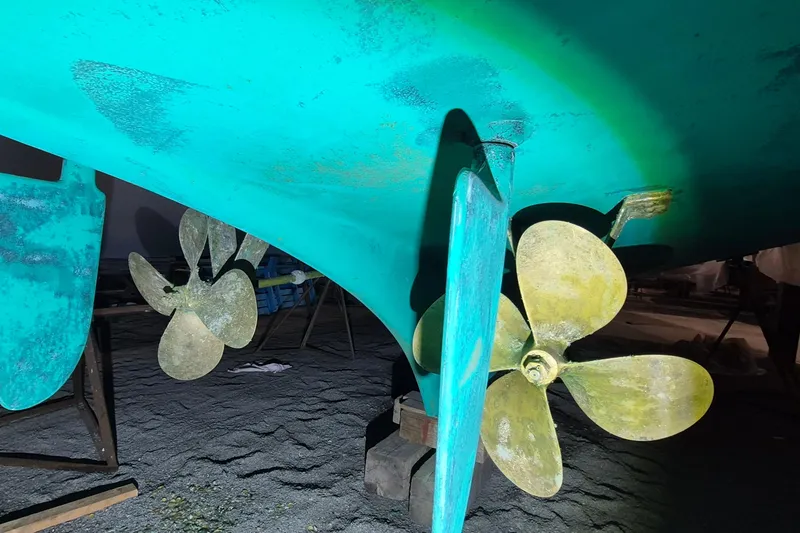 Slide: The Image of Propeller and rudder of 1985 Grand Banks 42 Classic boat, in dry dock. - 115