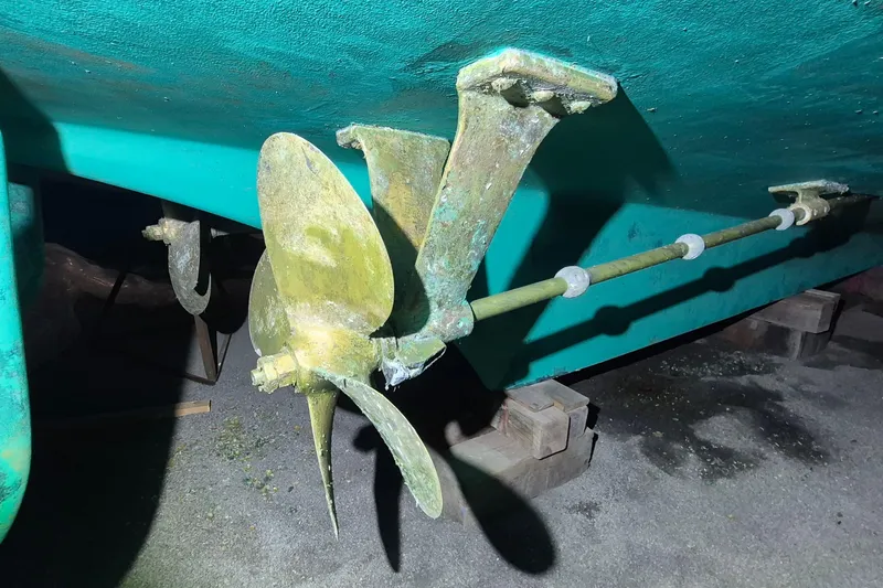 Slide: The Image of Propeller and shaft of 1985 Grand Banks 42 Classic boat on blocks. - 116