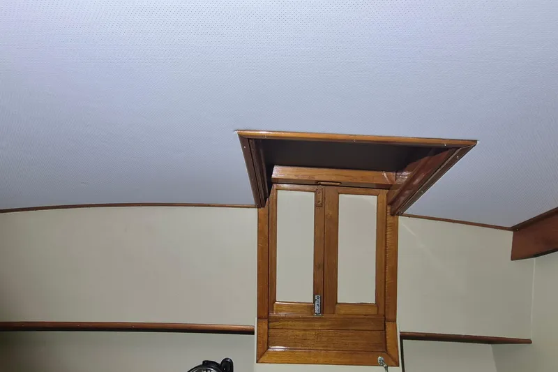 Slide: The Image of Wooden hatch detail on 1985 Grand Banks 42 Classic yacht interior ceiling. - 14
