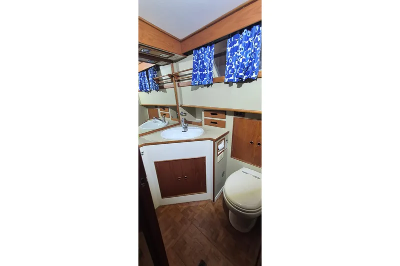 Slide: The Image of Bathroom interior of 1985 Grand Banks 42 Classic yacht with sink and toilet. - 16