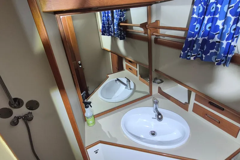 Slide: The Image of Bathroom interior of 1985 Grand Banks 42 Classic yacht with sink and mirror. - 17