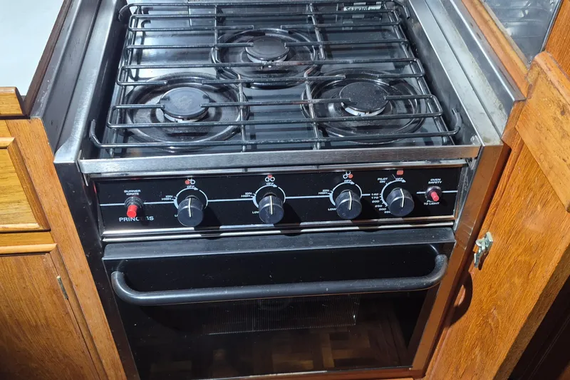 Slide: The Image of Stove and oven in 1985 Grand Banks 42 Classic yacht kitchen. - 21