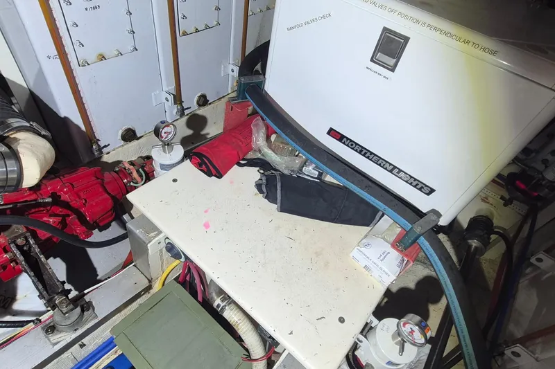 Slide: The Image of Engine room of 1985 Grand Banks 42 Classic with Northern Lights generator and tools. - 31