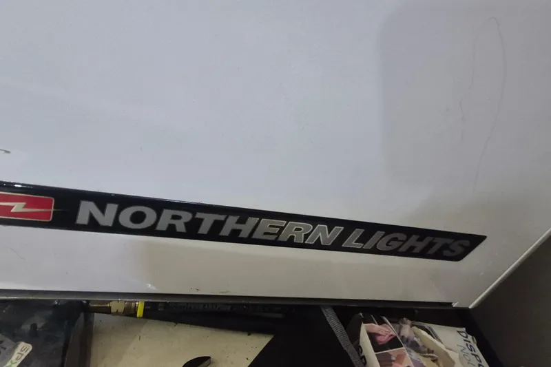 Slide: The Image of Northern Lights logo on 1985 Grand Banks 42 Classic yacht engine panel. - 33