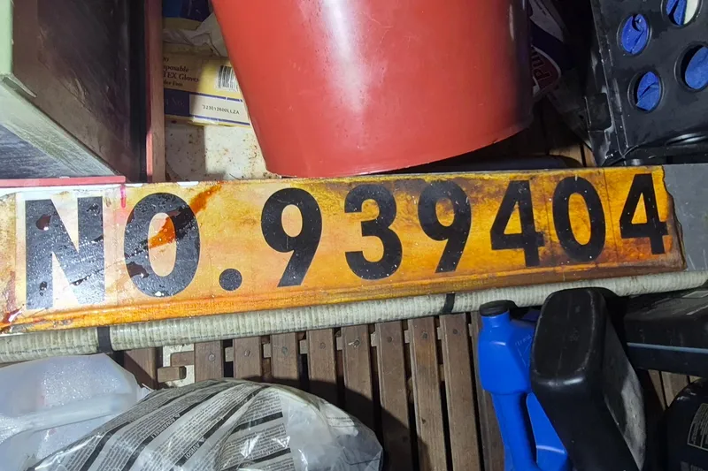 Slide: The Image of Vintage Grand Banks 42 Classic 1985 boat registration number 939404 in storage area. - 42