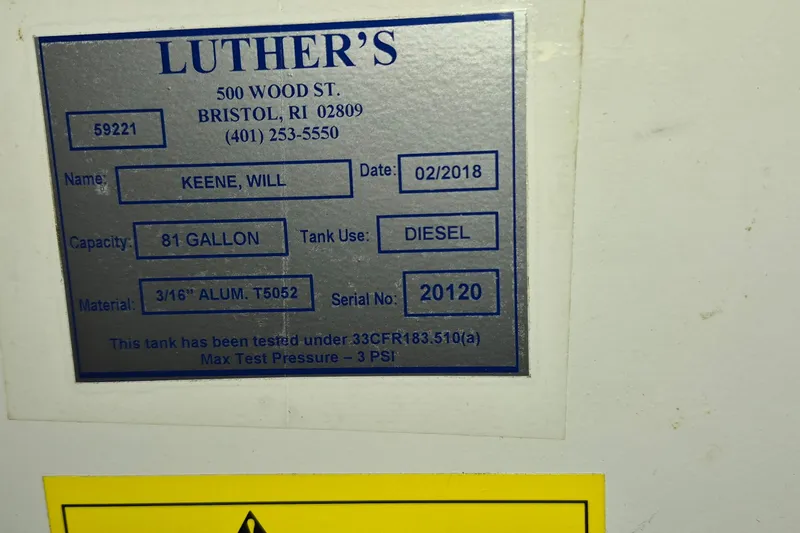 Slide: The Image of Label on diesel tank, 81-gallon capacity, tested, Grand Banks 42 Classic, 1985. - 52