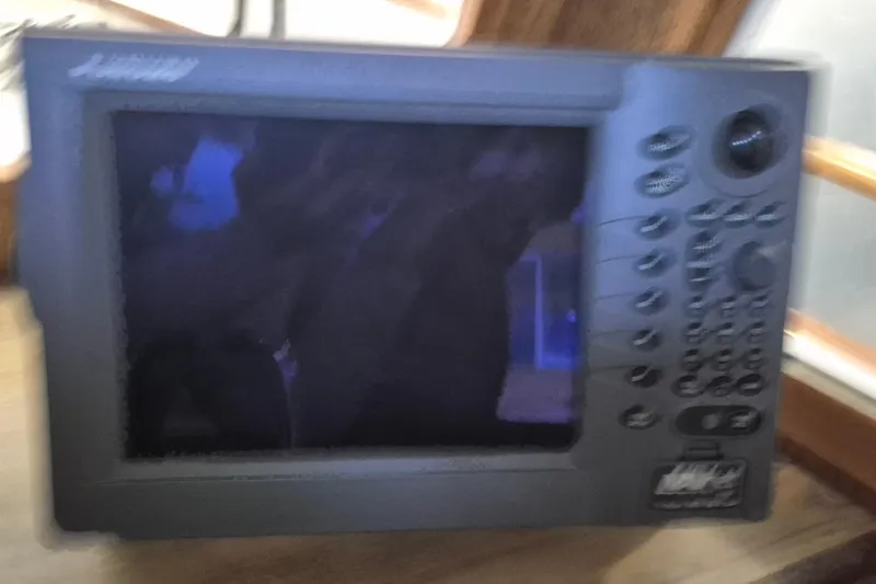 Slide: The Image of Navigation equipment on a 1985 Grand Banks 42 Classic yacht. - 61