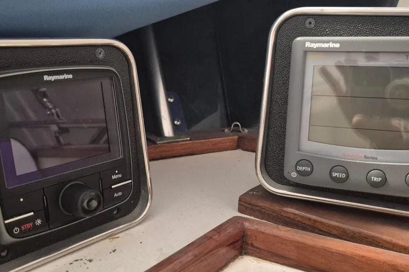 Slide: The Image of Raymarine navigation instruments on 1985 Grand Banks 42 Classic yacht dashboard. - 73