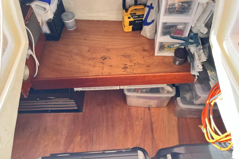 Slide: The Image of Workshop area on a 2001 Beneteau 473 sailboat with organized tools and storage. - 41