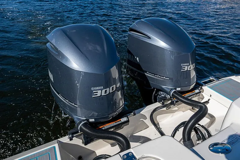 Slide: The Image of Twin Yamaha 300 outboard engines on a 2021 Cobia 320 Center Console boat. - 15