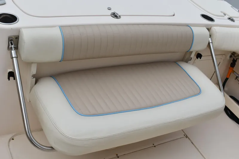 Slide: The Image of Open storage compartment on a 2012 Grady-White Canyon 271 boat. - 12