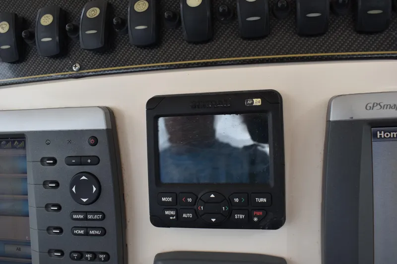 Slide: The Image of Open storage compartment on 2012 Grady-White Canyon 271 boat. - 21