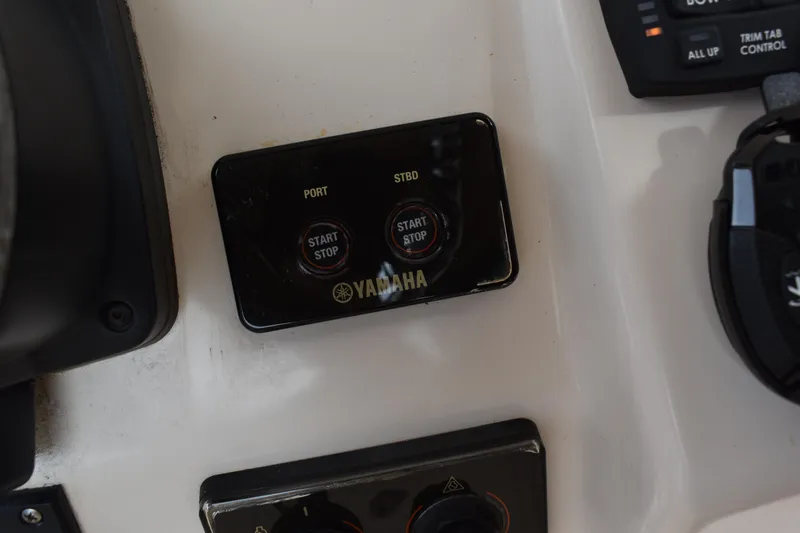 Slide: The Image of 2012 Grady-White Canyon 271 boat canopy with speaker and clear sky background. - 25