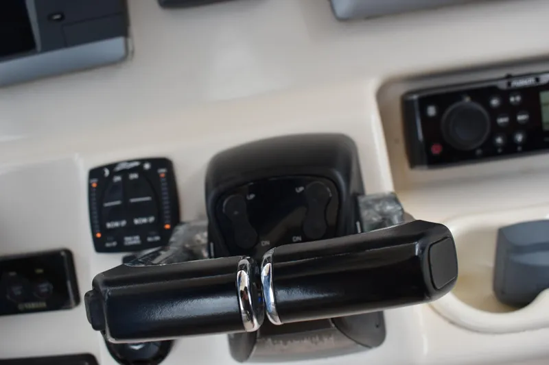 Slide: The Image of VHF radio system inside a 2012 Grady-White Canyon 271 boat compartment. - 26