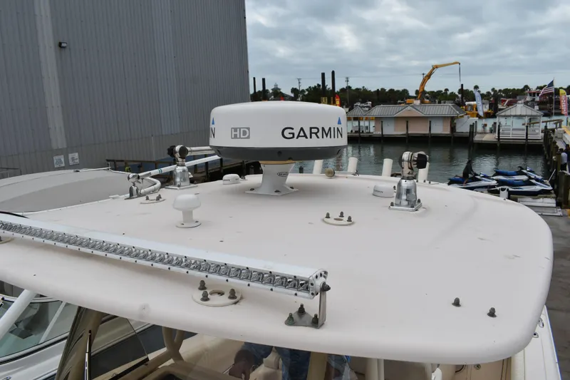 Slide: The Image of Fusion marine stereo system on 2012 Grady-White Canyon 271 boat dashboard. - 34