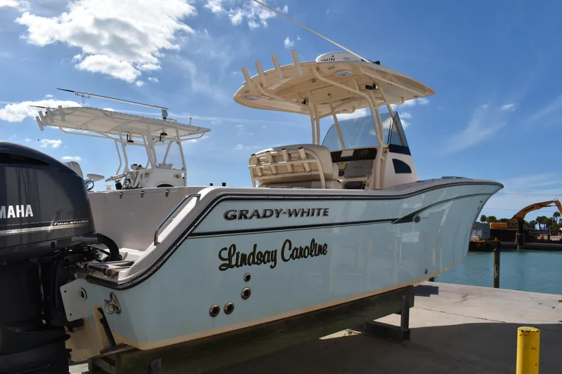 Slide: The Image of Storage compartment on 2012 Grady-White Canyon 271 with life jackets and a fender. - 43