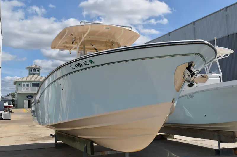 Slide: The Image of Interior of 2012 Grady-White Canyon 271 boat with marine toilet and storage items. - 47