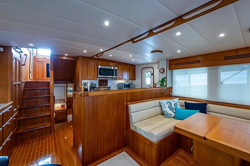 Slide: The Image of Luxurious 2016 Kadey-Krogen 52 yacht interior with wood finish and modern amenities. - 10