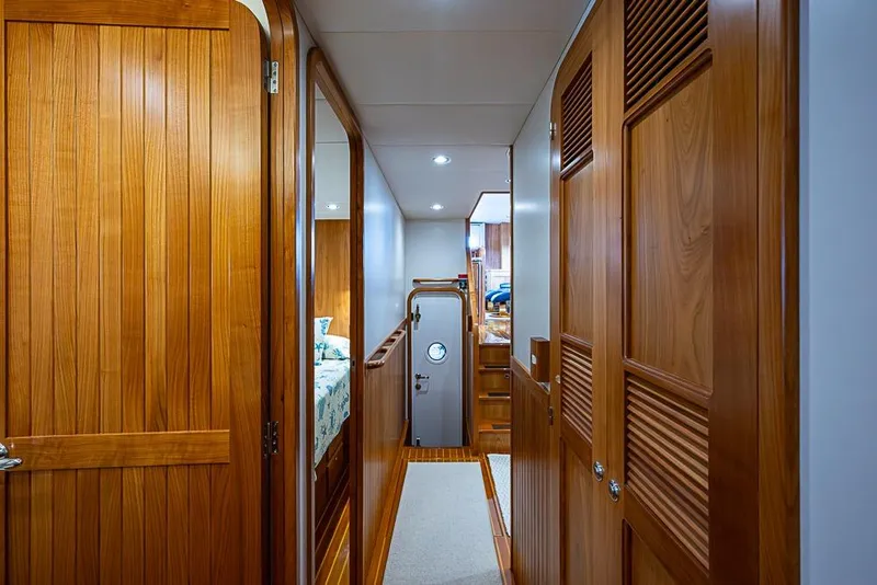 Slide: The Image of Luxurious wooden interior of 2016 Kadey-Krogen 52 yacht hallway. - 31