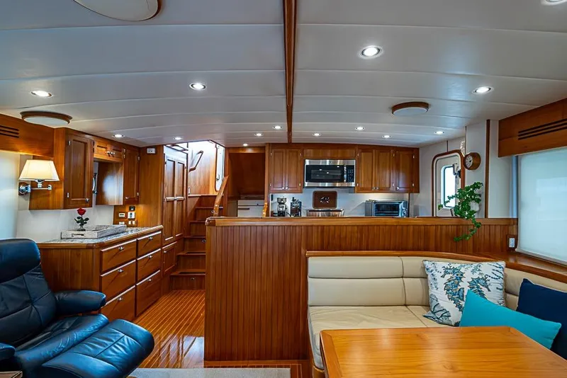 Slide: The Image of Luxurious 2016 Kadey-Krogen 52 yacht interior with elegant wood finishes and modern amenities. - 5