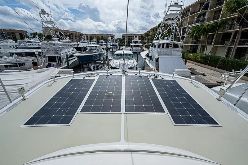 Slide: The Image of 2016 Kadey-Krogen 52 yacht with solar panels docked at marina. - 70