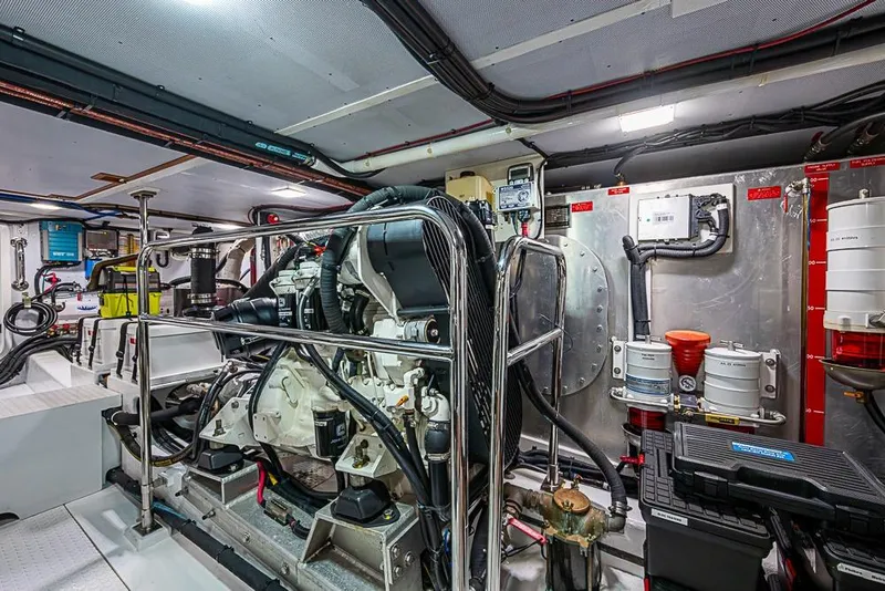 Slide: The Image of Engine room of 2016 Kadey-Krogen 52 yacht, showcasing machinery and equipment. - 75