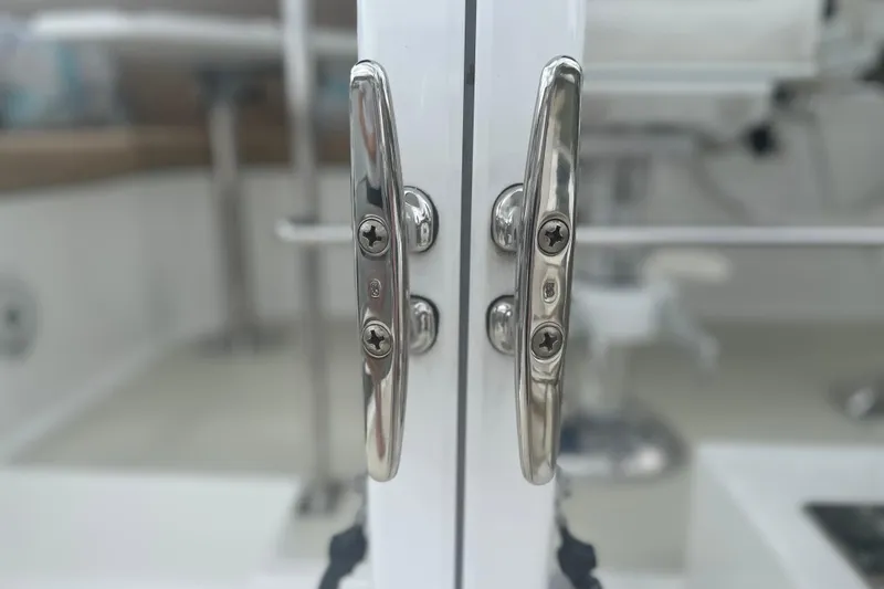 Slide: The Image of Close-up of stainless steel handles on a 2016 Kadey-Krogen 52 yacht. - 84