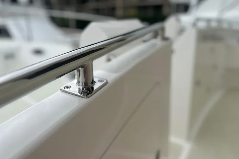 Slide: The Image of Close-up of a 2016 Kadey-Krogen 52 yacht's polished stainless steel railing. - 85