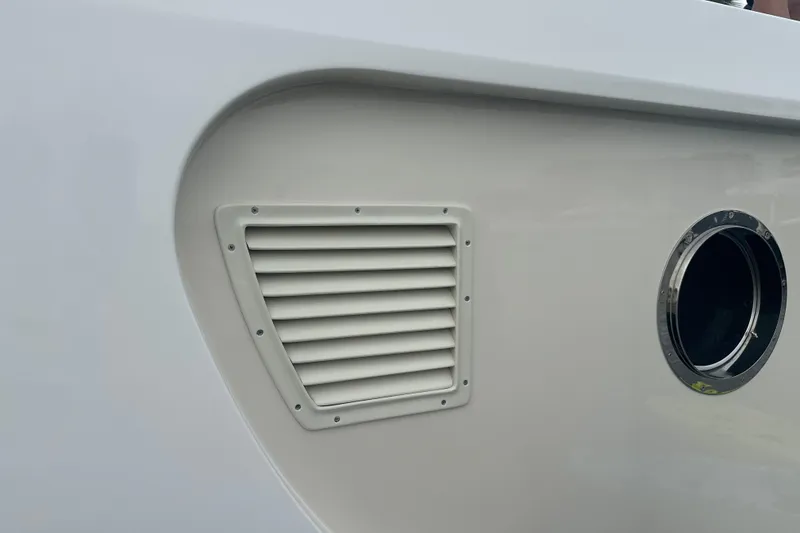 Slide: The Image of Close-up of 2016 Kadey-Krogen 52 yacht vent and porthole detail. - 92
