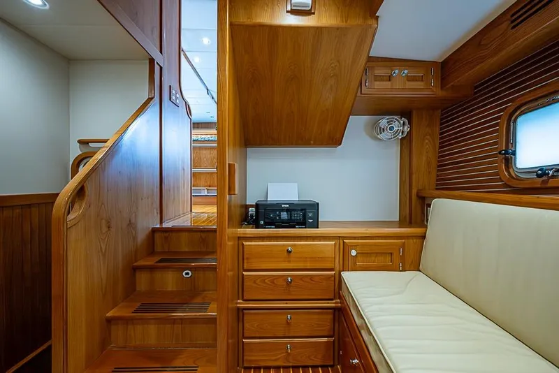 Slide: The Image of Luxurious 2016 Kadey-Krogen 52 yacht interior with wooden cabinetry and seating. - 38