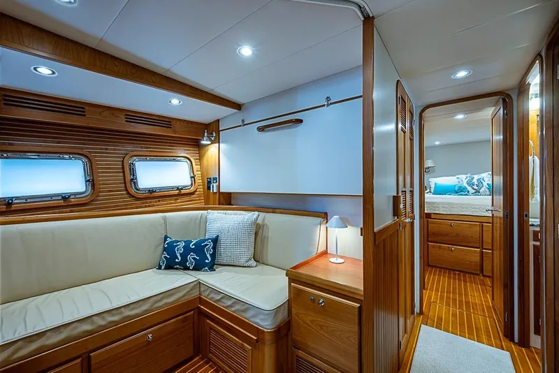 Slide: The Image of Luxurious interior of 2016 Kadey-Krogen 52 yacht with cozy seating and elegant wood finish. - 39