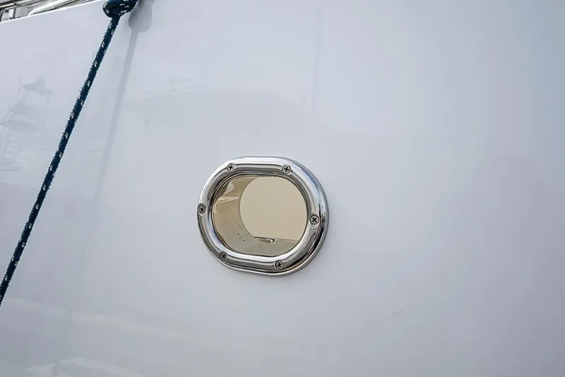Slide: The Image of Porthole on 2016 Kadey-Krogen 52 yacht, featuring sleek metal frame. - 72