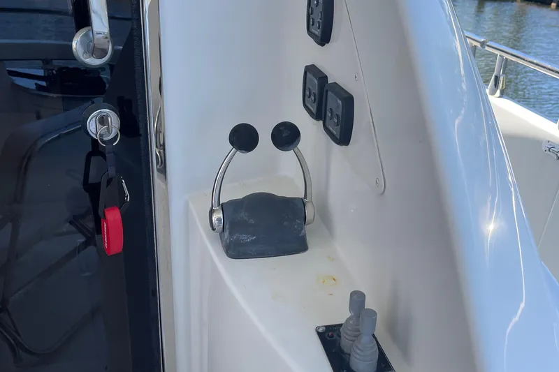 Slide: The Image of Luxurious 2006 Marquis 59 yacht bathroom with modern fixtures and cozy bedroom view. - 17