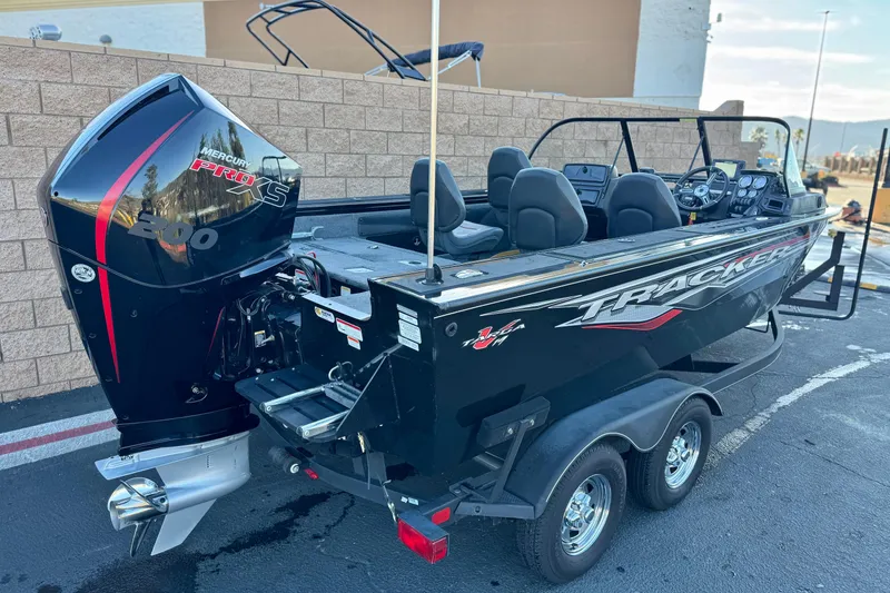 Slide: The Image of 2023 Tracker Targa V-19 WT boat with Mercury Pro XS 200 engine, parked on trailer. - 5