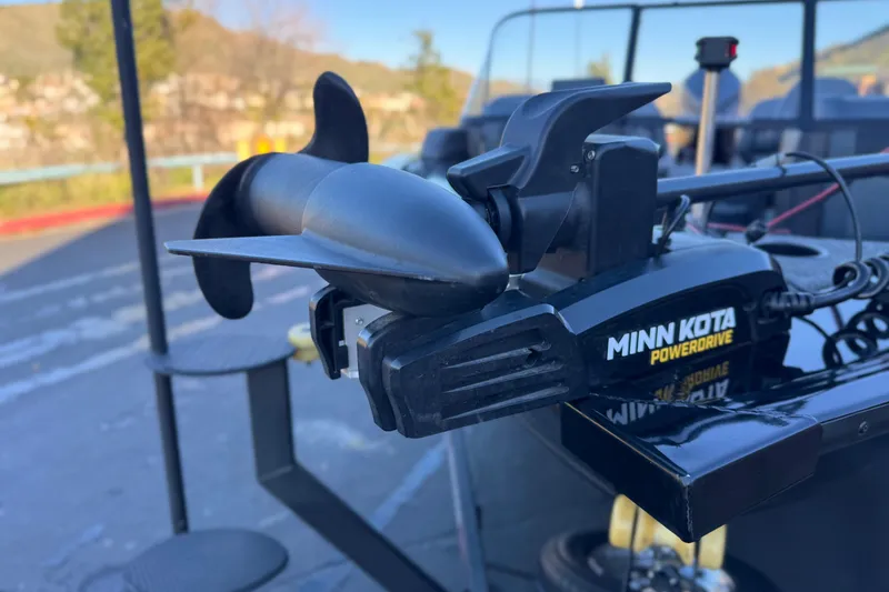 Slide: The Image of Minn Kota PowerDrive motor on 2023 Tracker Targa V-19 WT boat, outdoor setting. - 9