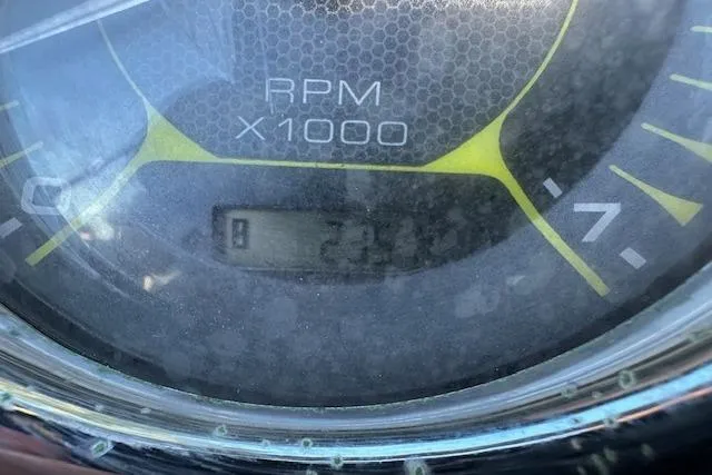 Slide: The Image of Close-up of a 2022 Sea Ray SPX 210 tachometer displaying RPM readings. - 25
