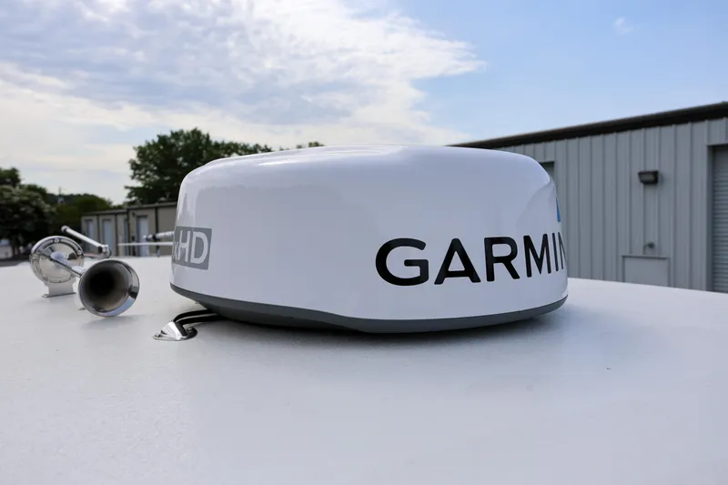 Slide: The Image of Garmin radar on 2023 Key West 263 FS boat, with clear sky background. - 24