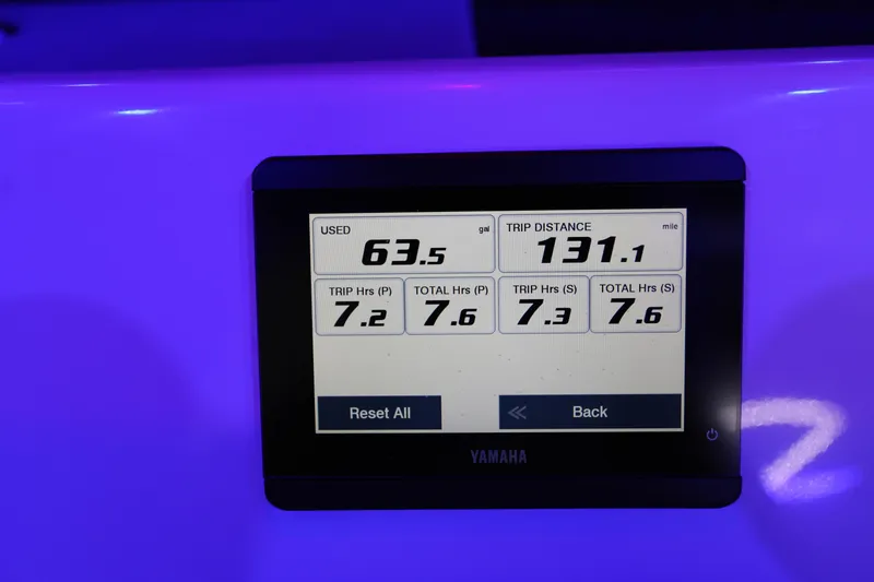 Slide: The Image of Display screen on 2023 Key West 263 FS showing trip data and fuel usage. - 36