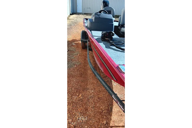 Slide: The Image of 2026 Tracker Bass Tracker Classic XL boat on a trailer, side view. - 11