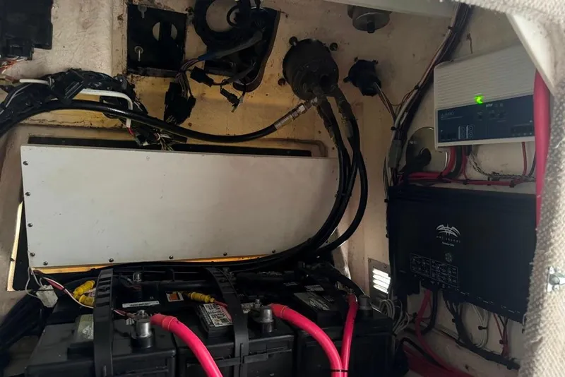 Slide: The Image of Electrical components inside a 2003 Regulator 26 Forward Seating boat. - 27