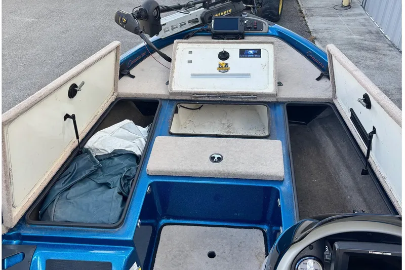 Slide: The Image of 2005 Ranger 185 VX boat interior with storage compartments and navigation equipment. - 6