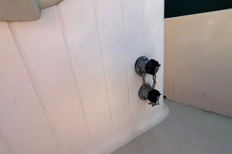 Slide: The Image of Fuel caps on a 1983 Bristol Channel Cutter 28 sailboat deck. - 18