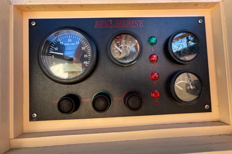 Slide: The Image of Instrument panel of a 1983 Bristol Channel Cutter 28 with gauges and indicators. - 19