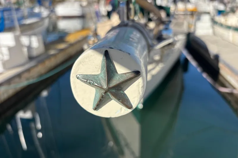 Slide: The Image of Close-up of a star-shaped detail on a 1983 Bristol Channel Cutter 28 sailboat. - 26
