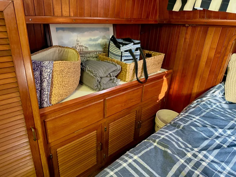 Slide: The Image of Interior of a 1988 PT 42 Yacht with wooden furnishings. - 17